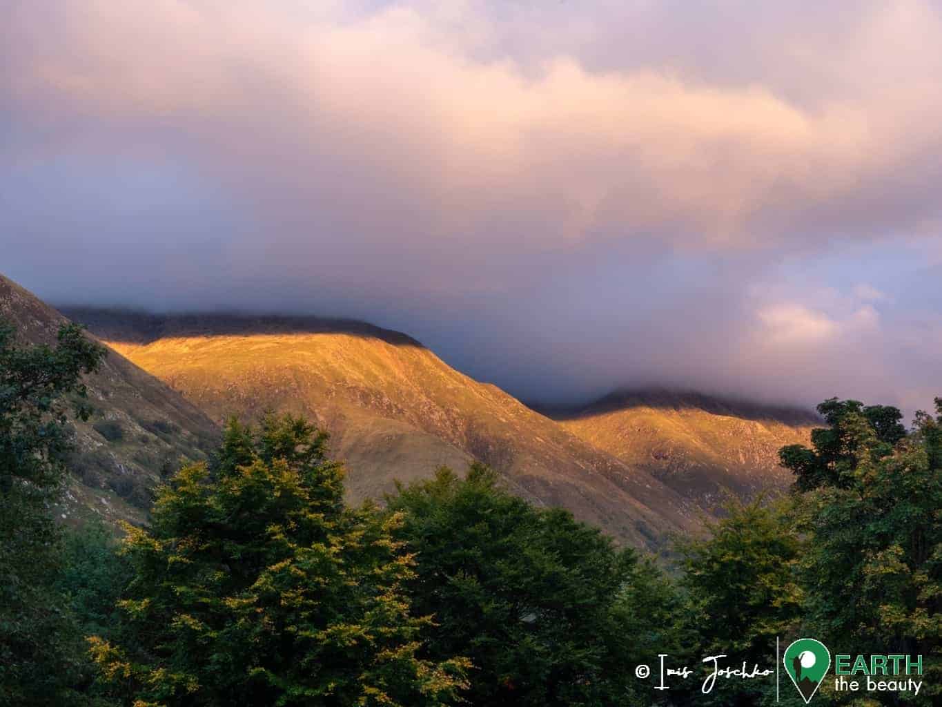 mountain in fort william scotland in the evening with clouds